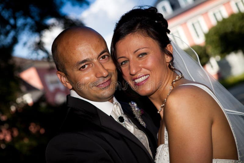 Turkish couple say yes on her wedding day. the marriage took place in germany and the honeymoon goes to tunis. this is a very attractive muslim couple in their 30s. Turkish couple say yes on her wedding day. the marriage took place in germany and the honeymoon goes to tunis. this is a very attractive muslim couple in their 30s.