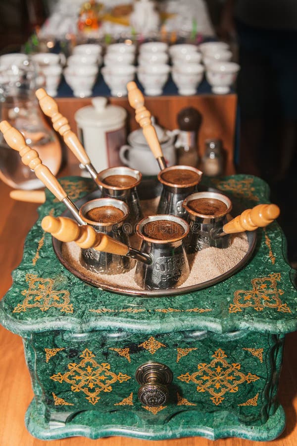 Turkish Coffee Brewed on Sand in Cezve. Oriental, East Coffee Stock