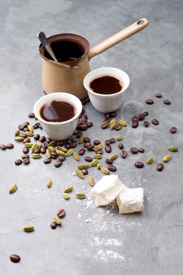 Turkish Coffee with Coffee Beans and Cardamom Scattered on a Vintage