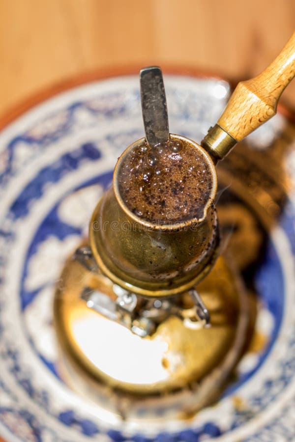 Turkish Coffee Pot Boiling on Portable Stove. Stock Photo Image of portable, craft 81003556