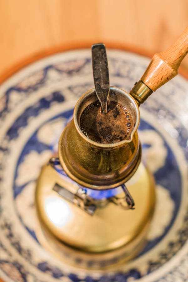 Turkish Coffee Pot Boiling. Coffee Brewing and Drinking Ceremony. Stock