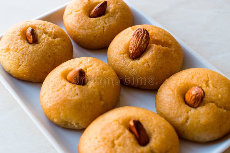 Turkish Dessert Sekerpare / Small cakes with Almond and Sherbet royalty free stock photo Turkish Dessert Sekerpare / Small cakes with Almond and Sherbet royalty free stock photo