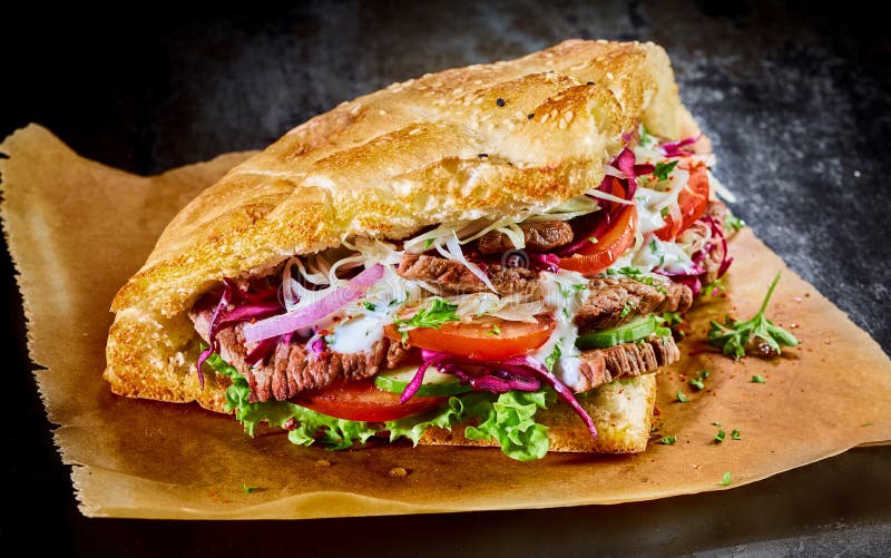 Turkish doner kebab on golden toasted pita bread royalty free stock image Turkish doner kebab on golden toasted pita bread royalty free stock image