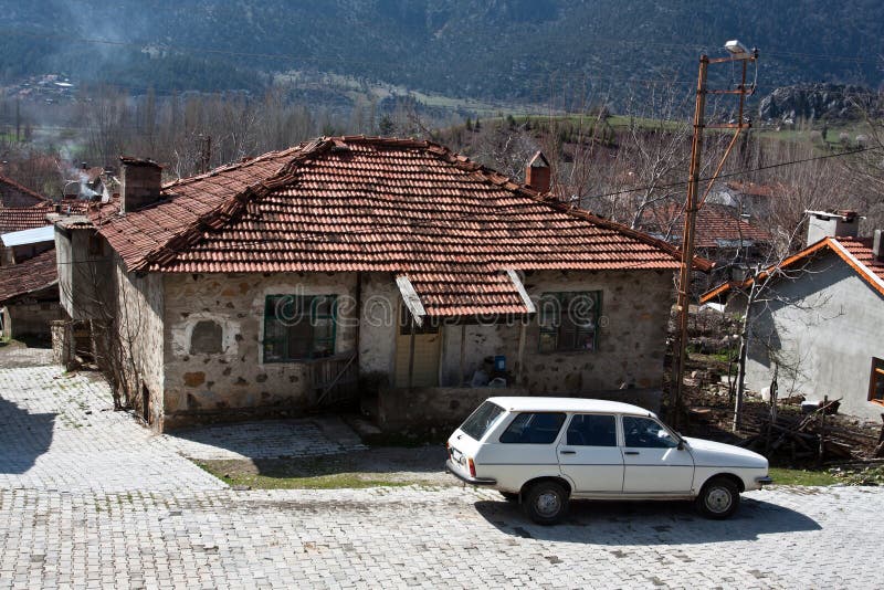 Old traditional turkish house with white car. Old traditional turkish house with white car.
