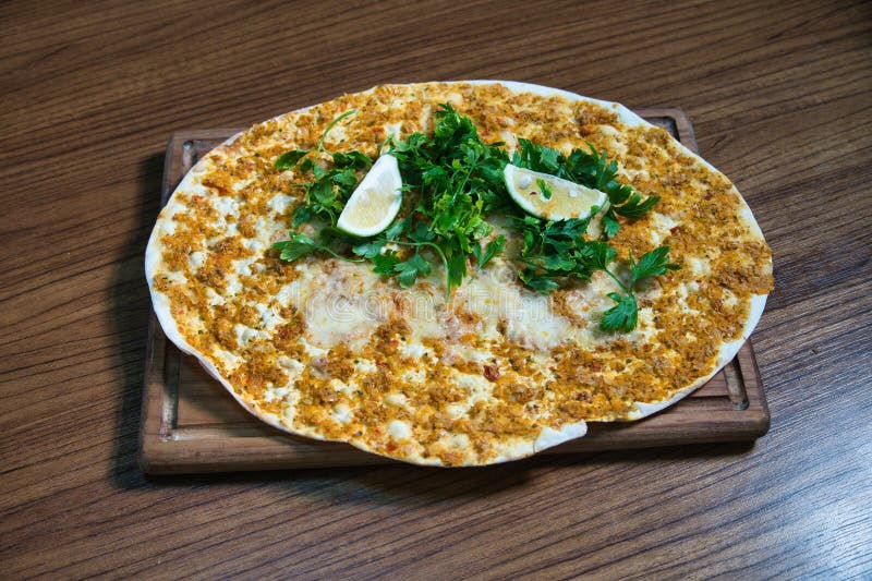 Turkish Lahmacun With Parsley and Lemon royalty free stock photography