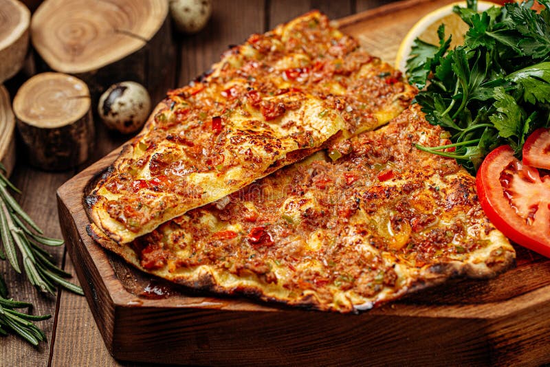 Turkish lahmacun pizza with mince and tomatoes stock photo