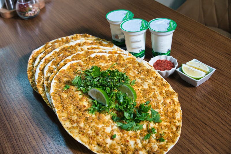 Turkish Lahmacun With Yogurt and Lemon royalty free stock photography