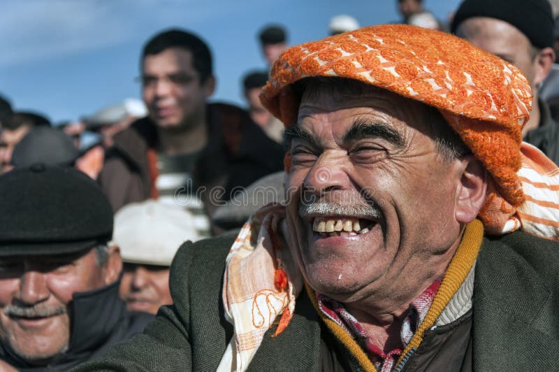 turkish-man-smiling-crowd-52180260.jpg