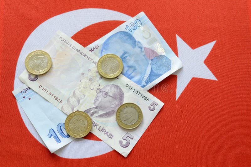 Turkish national currency lira on turkish flag