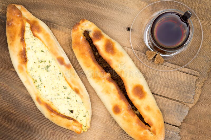 Turkish pides wth cheese and beef and hot tea