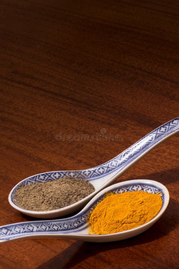 Turmeric and black pepper stock image. Image of cancer 66190599