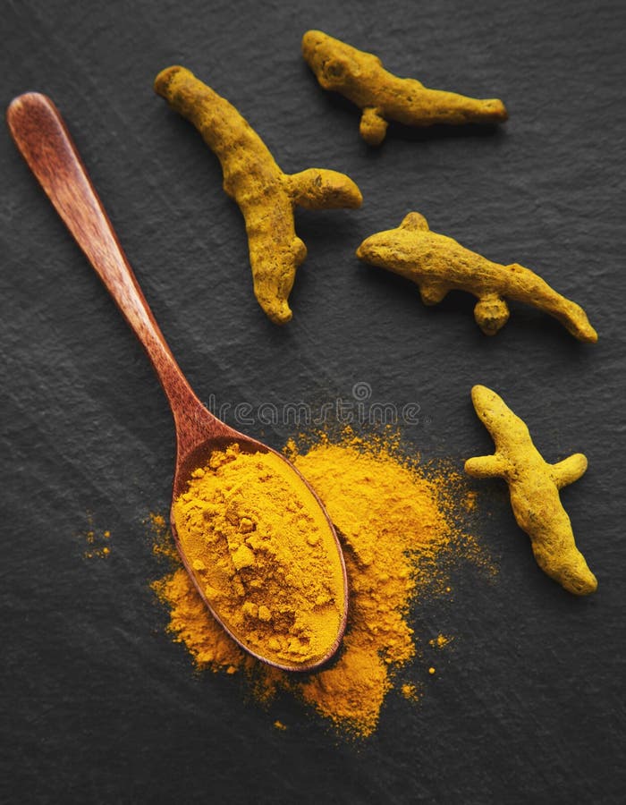 Turmeric Powder and Turmeric Root Stock Photo Image of closeup