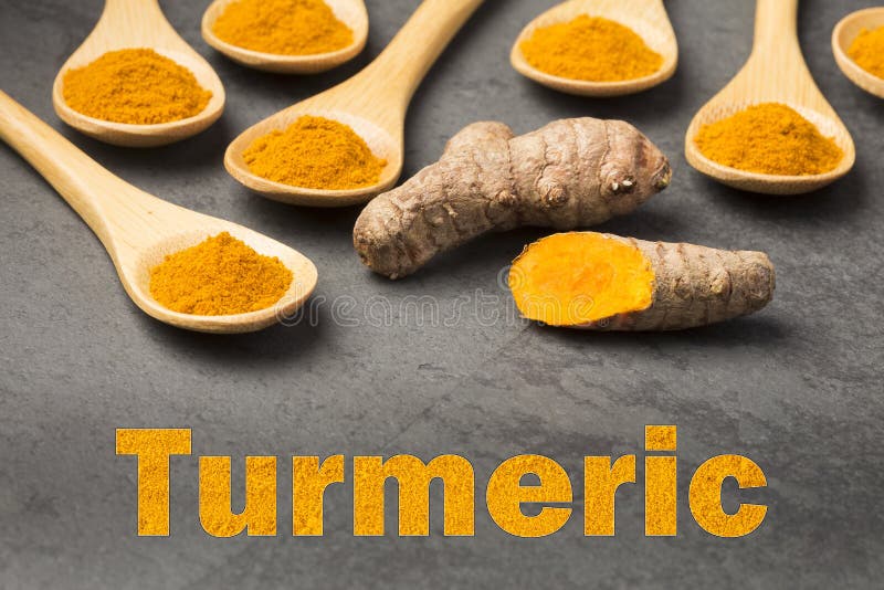 Turmeric prochowy i świeży turmeric - Kurkumowy longa obraz stock Turmeric prochowy i świeży turmeric - Kurkumowy longa obraz stock