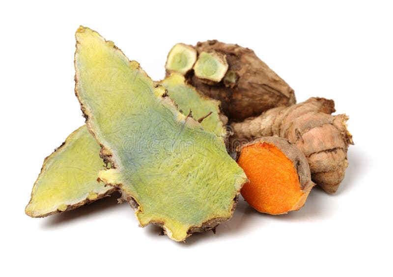 Turmeric Root With Green Leaves Isolated On White Stock Photo Image
