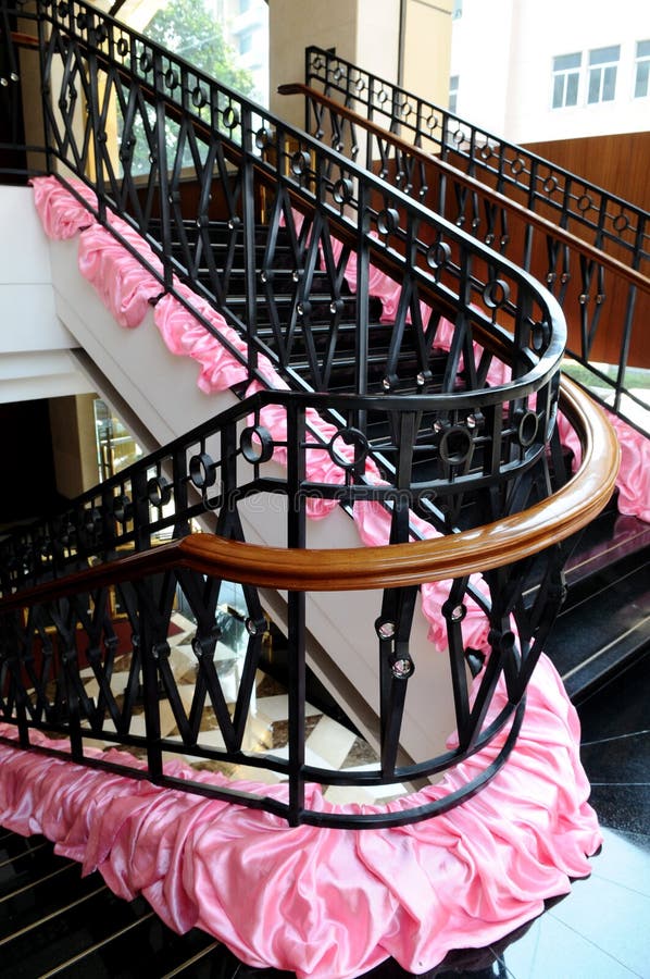 The turning staircase with iron railings