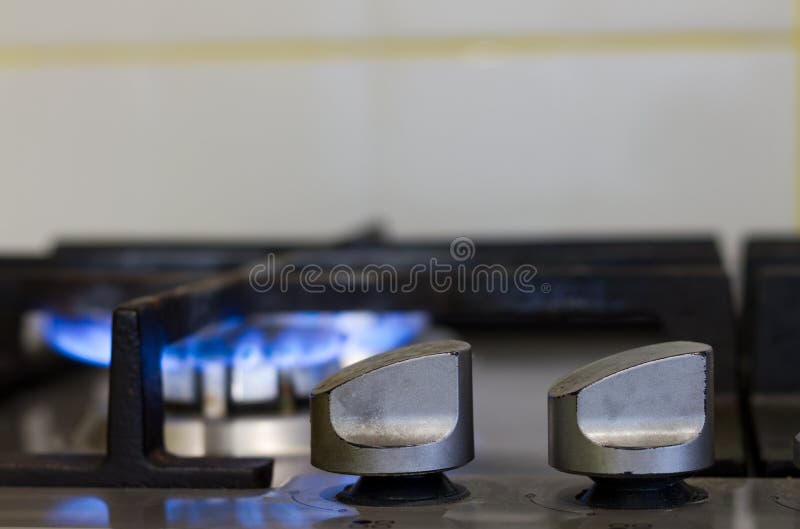 Turns on gas stove stock photo. Image of oven, flame 47071082