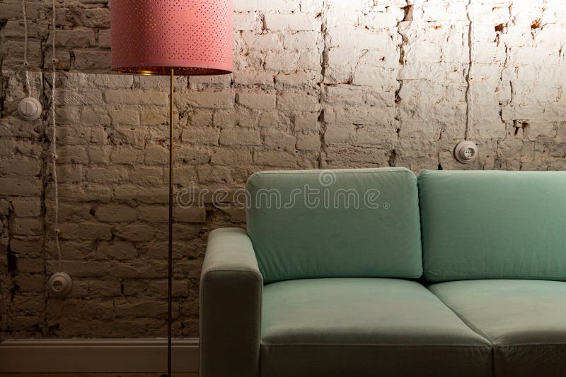 Turquoise Sofa Against a White Brick Wall Stock Image Image of house