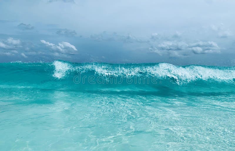 Turquoise water and big waves in Seychelles - La Digue beach. Travel and vacation wallpaper royalty free stock image Turquoise water and big waves in Seychelles - La Digue beach. Travel and vacation wallpaper royalty free stock image