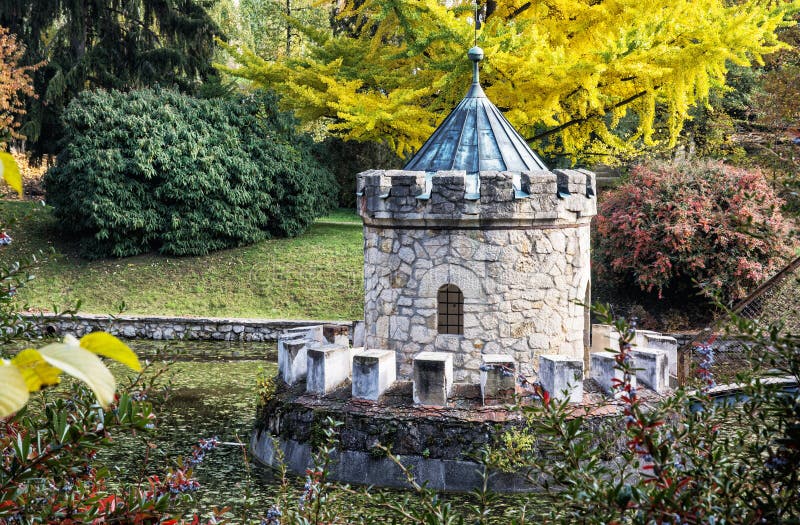 Turret in Bojnice, autumn park, seasonal colorful park scene