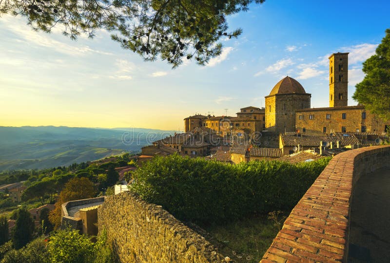 Tuscany, Volterra town skyline, church and trees on sunset. Ital royalty free stock photography Tuscany, Volterra town skyline, church and trees on sunset. Ital royalty free stock photography