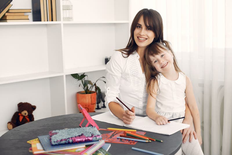 Tutor with Litthe Girl Studying at Home Stock Image - Image of mother ...