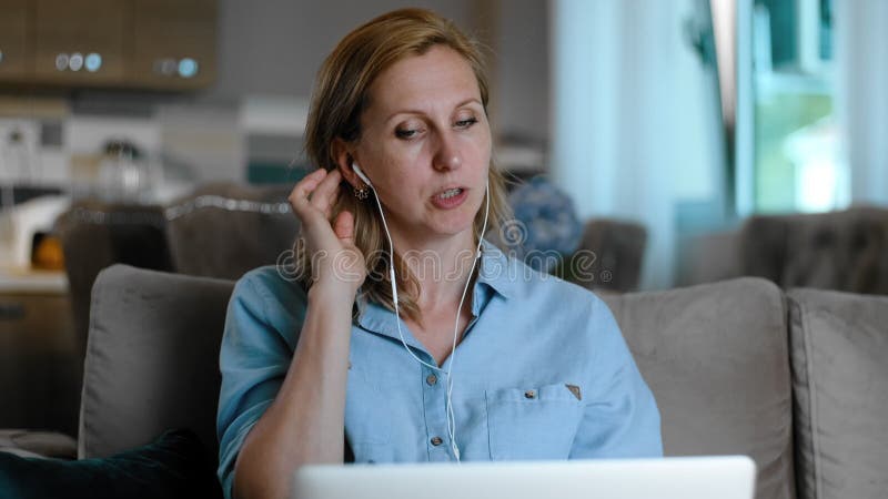 Tutor teacher talking with client on online video call Rbbro. woman explain, consult with gesture