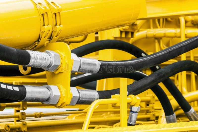 Tuyaux de l'hydraulique et becs, tracteur images libres de droits Tuyaux de l'hydraulique et becs, tracteur images libres de droits