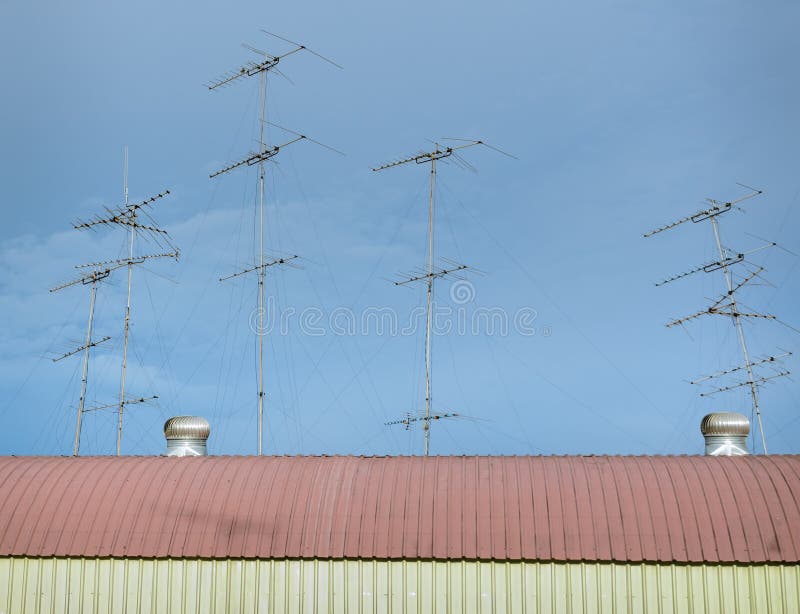 TV antennas on the roof stock photo. Image of aerial 43738516