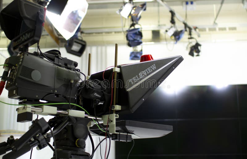 TV Camera in the Studio. Teleprompter and Professional Highdefinition Video Camera on a Tripod