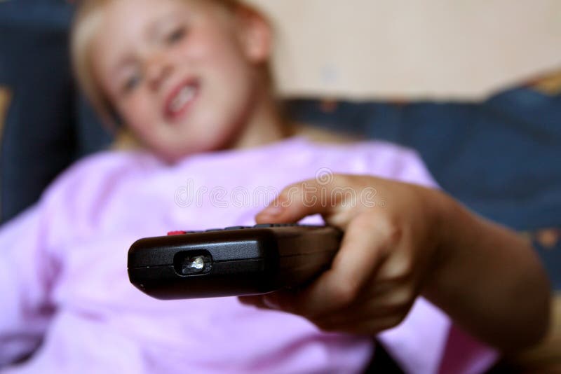 Little girl and remote control. Little girl and remote control