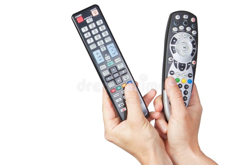 TV remotes in their hands. stock photo. Image of program 23957418
