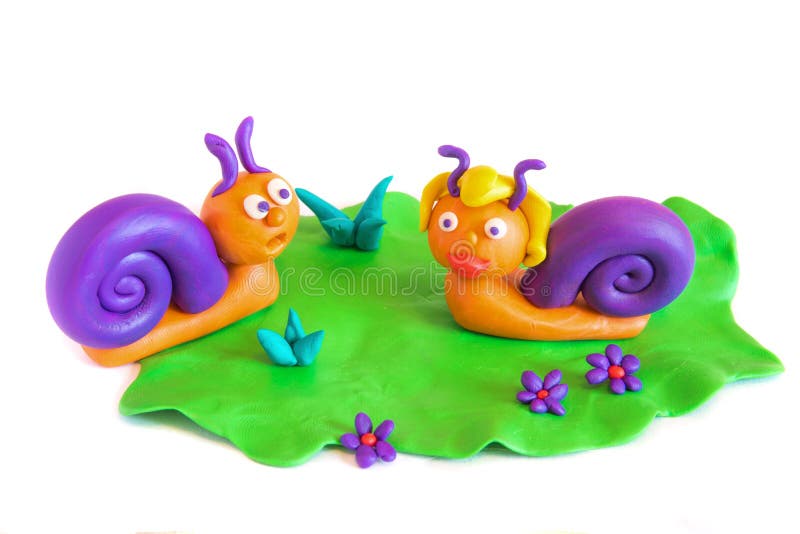 Två snails, modellera för lera.