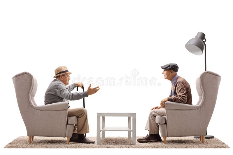 Två äldre män som placeras i fåtöljer som har en konversation