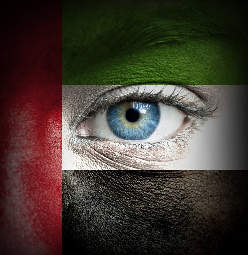 Twarz ludzka malująca z flagą Zjednoczone Emiraty Arabskie fotografia royalty free Twarz ludzka malująca z flagą Zjednoczone Emiraty Arabskie fotografia royalty free