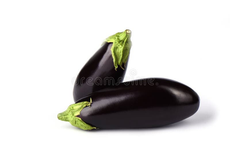 Twee aubergines of aubergines die op witte achtergrond worden geïsoleerd stock afbeeldingen Twee aubergines of aubergines die op witte achtergrond worden geïsoleerd stock afbeeldingen