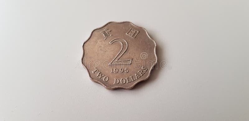 Twee dollarsmuntstuk van Hongkong op witte lijst stock foto's Twee dollarsmuntstuk van Hongkong op witte lijst stock foto's