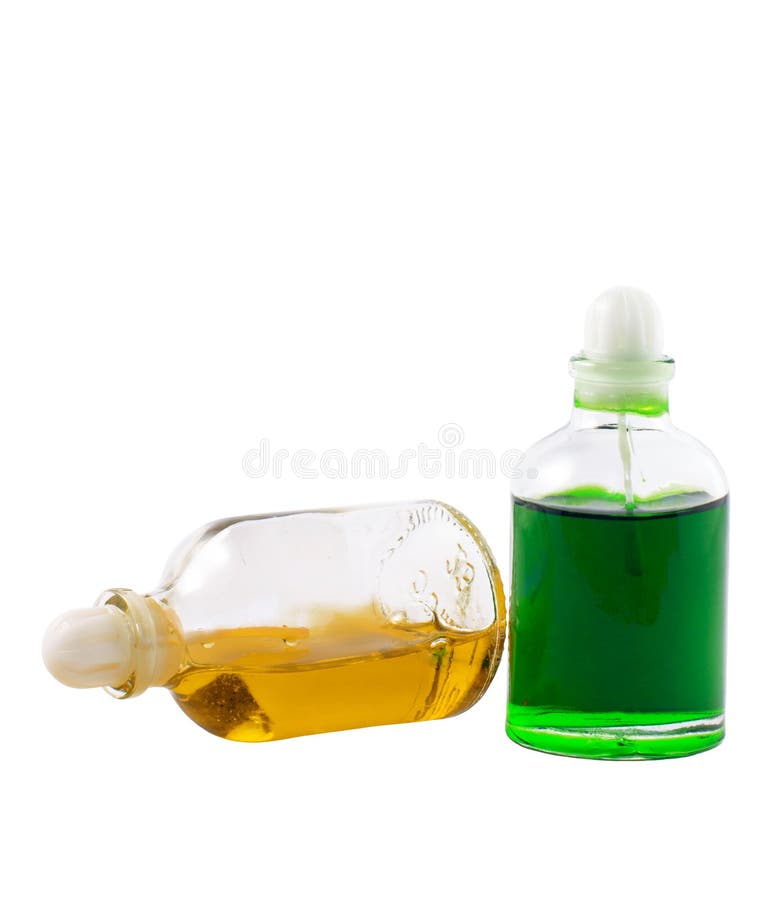 Twee flessen met aromatische oliën stock foto Twee flessen met aromatische oliën stock foto
