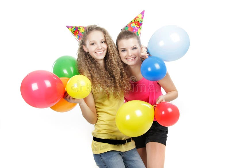 Twee gelukkige meisjes met kleurrijke ballons stock afbeeldingen Twee gelukkige meisjes met kleurrijke ballons stock afbeeldingen
