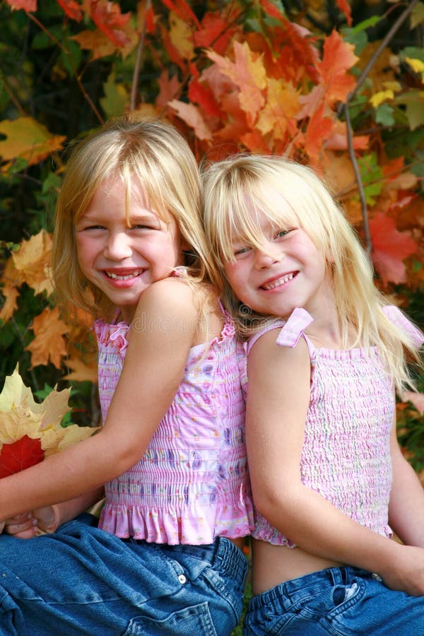 Twin girls stock image. Image of female, twins, fall, smile - 3303923