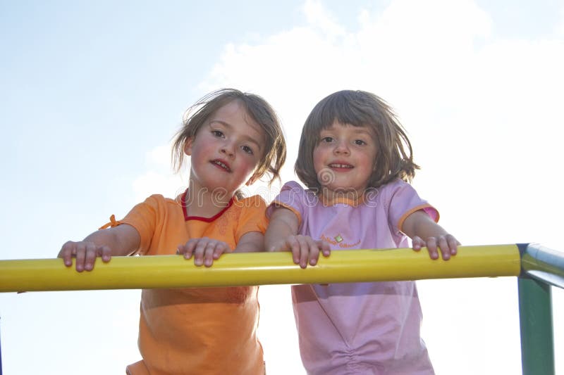 Girl on climbing pole 03 stock photo. Image of happy, girls 911010