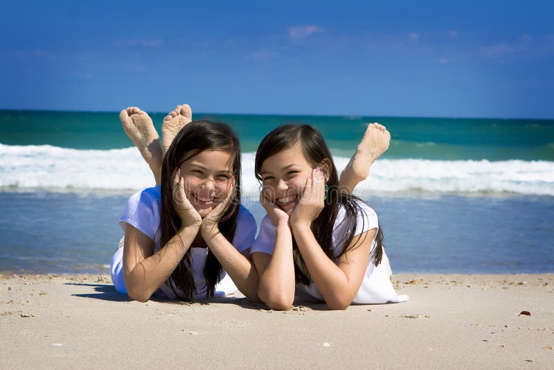 Twins and ocean royalty free stock photography Twins and ocean royalty free stock photography