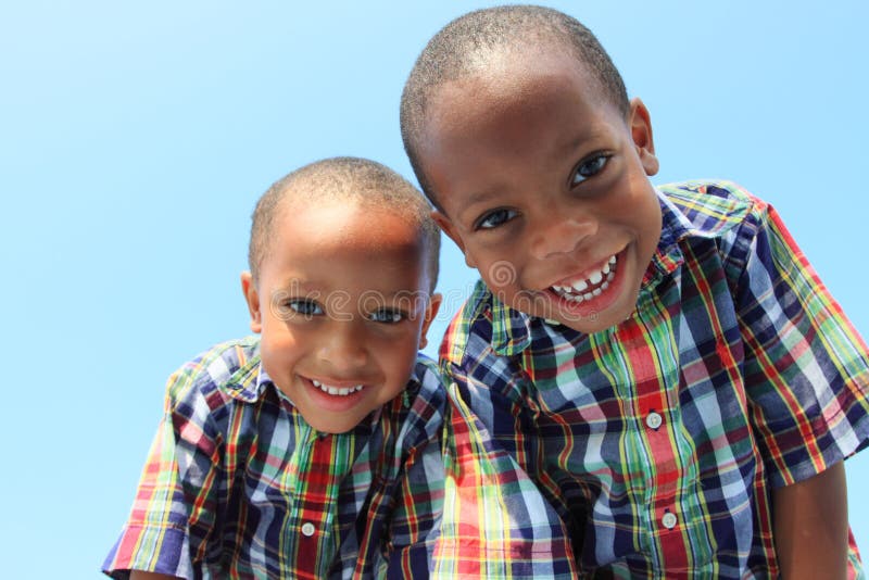 Twins Smiling Downward