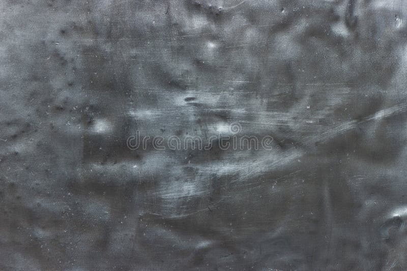 Worn metal sheet texture, steel background dark gray color