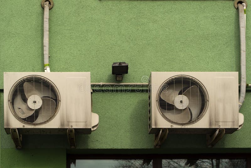 Two air conditioners stock image. Image of electricity 53479541