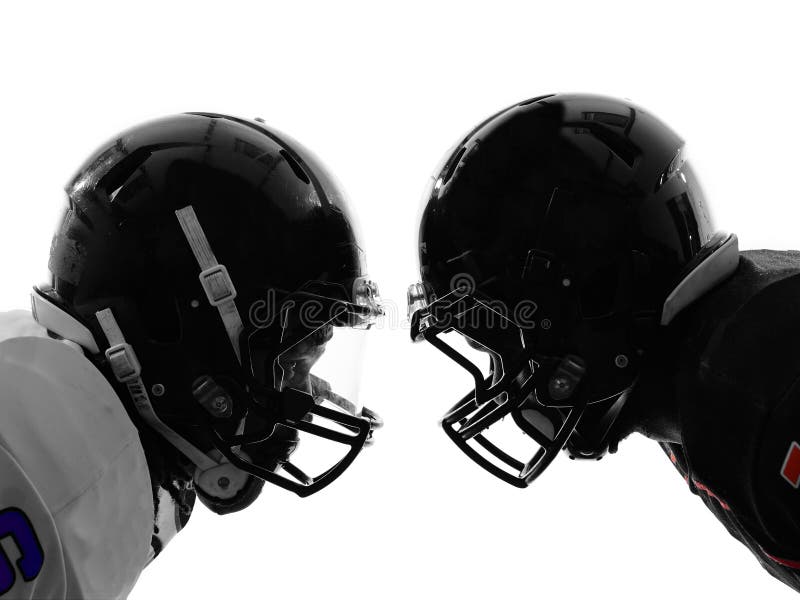 Two american football players face to face silhouette stock photo Two american football players face to face silhouette stock photo