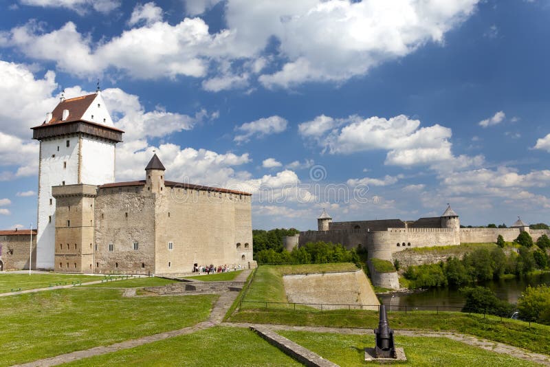Two ancient fortresses on the parties from the river which is border. Narva, Estonia and Ivangorod behind the river, Russia. Two ancient fortresses on the stock photography Two ancient fortresses on the parties from the river which is border. Narva, Estonia and Ivangorod behind the river, Russia. Two ancient fortresses on the stock photography