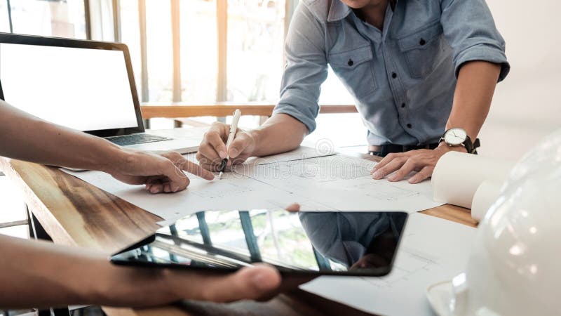 Two Architects engineer discussing data working and tablet, lap royalty free stock images