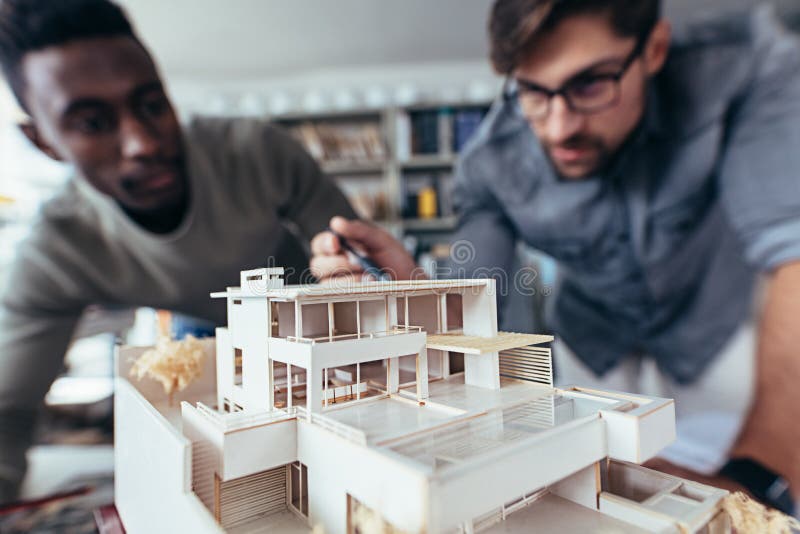 Two Architects Making Architectural Model in Office Stock Photo Image