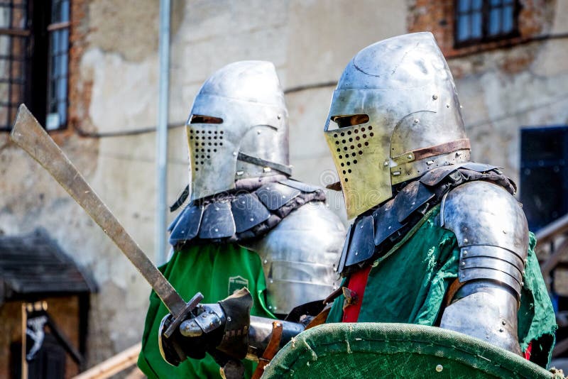 Two knights in armour stock photo. Image of helmet, brown - 23802668