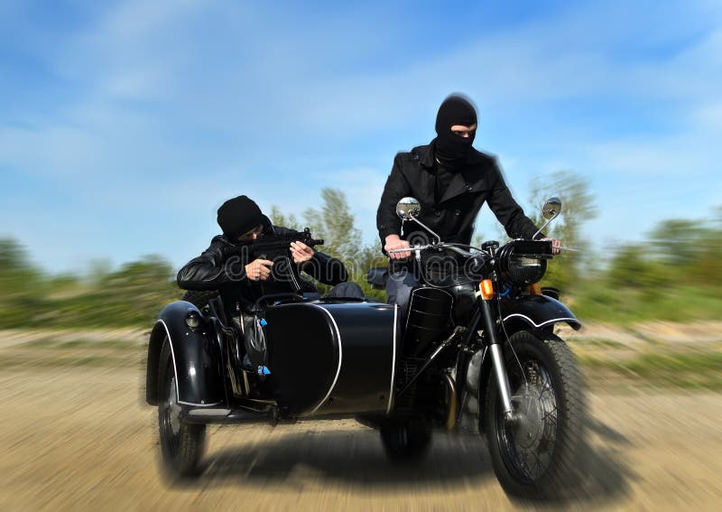 one armed motorcycle rider